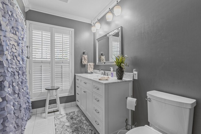 bathroom featuring vanity, toilet, ornamental molding, a shower with curtain, and tile patterned flooring