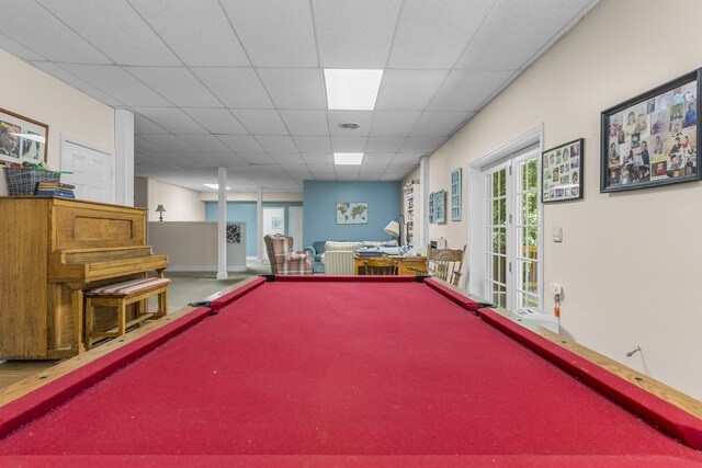 playroom with billiards and a paneled ceiling