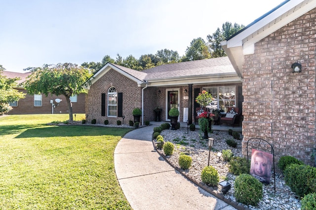 view of front of house with a front lawn