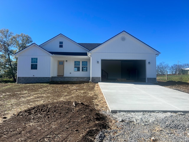 single story home featuring a garage