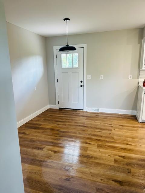 entrance foyer with light hardwood / wood-style flooring