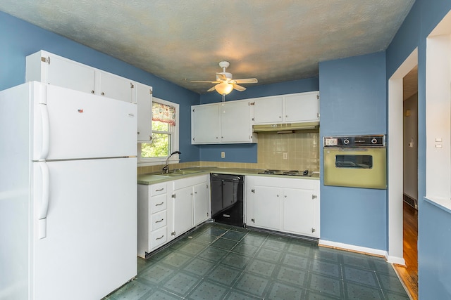 kitchen featuring a textured ceiling, black appliances, sink, ceiling fan, and white cabinets