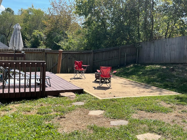 view of yard with a deck