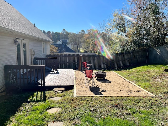 view of yard with a wooden deck