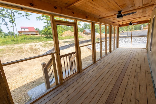 exterior space with ceiling fan