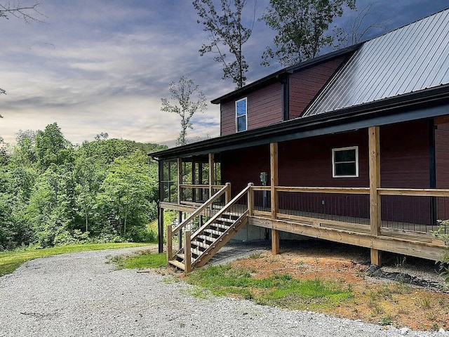 view of home's exterior featuring covered porch