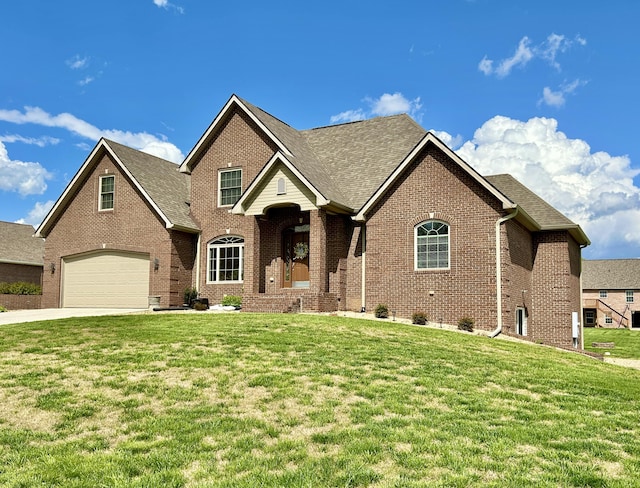 244 Water Cliff Dr, Somerset, KY 42503 - view of front of property with brick siding, a front lawn, a garage, and concrete driveway