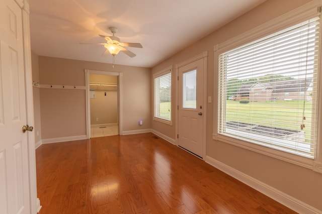 entryway featuring ceiling fan and hardwood / wood-style flooring