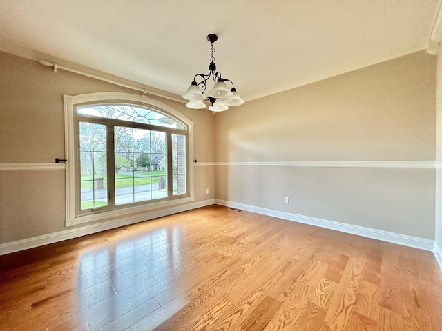 244 Water Cliff Dr, Somerset, KY 42503 - kitchen with arched walkways, a sink, appliances with stainless steel finishes, a peninsula, and light wood-style flooring