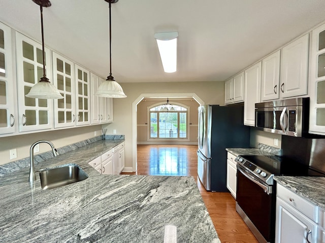 244 Water Cliff Dr, Somerset, KY 42503 - unfurnished bedroom with wood finished floors, baseboards, a ceiling fan, and visible vents