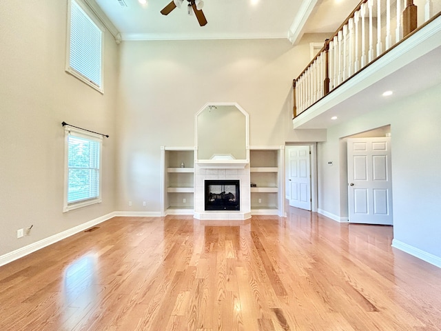 244 Water Cliff Dr, Somerset, KY 42503 - spare room featuring a tray ceiling, light wood-type flooring, a ceiling fan, visible vents, and baseboards
