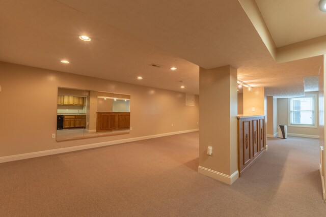 basement with carpet flooring