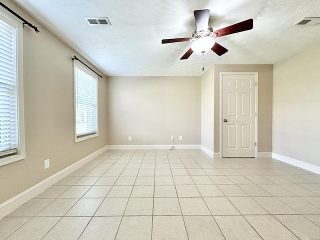 244 Water Cliff Dr, Somerset, KY 42503 - empty room featuring visible vents, baseboards, a ceiling fan, and a textured ceiling