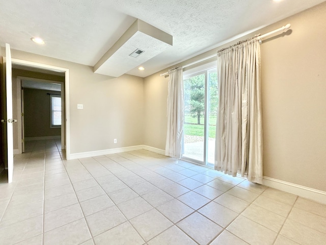 244 Water Cliff Dr, Somerset, KY 42503 - unfurnished room featuring baseboards, recessed lighting, light tile patterned floors, a textured ceiling, and visible vents