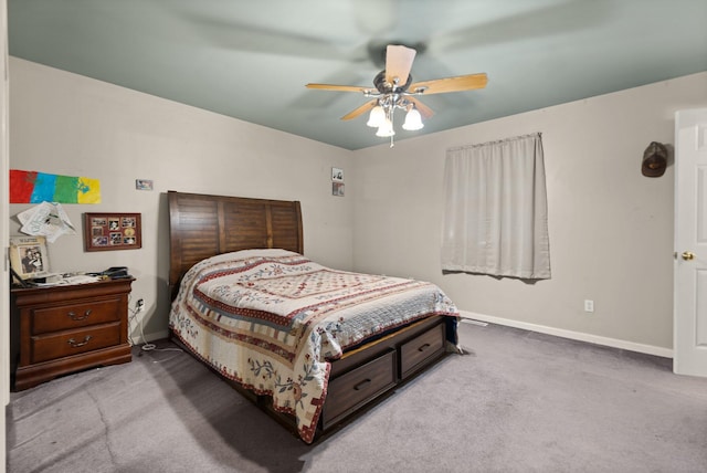 bedroom with light colored carpet and ceiling fan