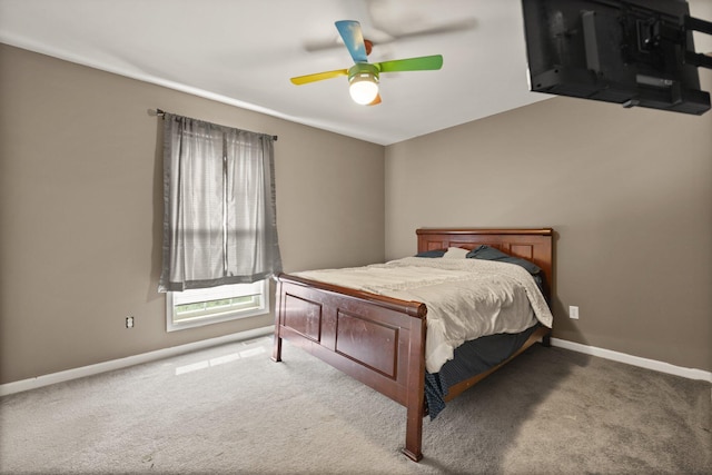 bedroom with ceiling fan and carpet floors