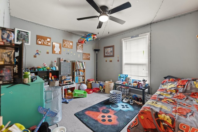carpeted bedroom featuring ceiling fan