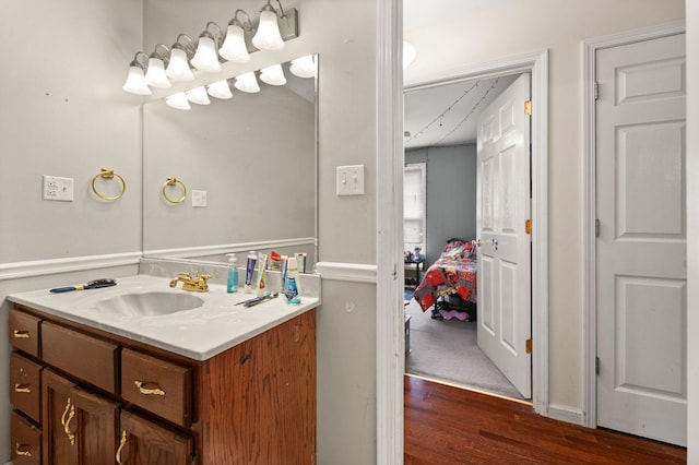 bathroom featuring vanity and hardwood / wood-style flooring