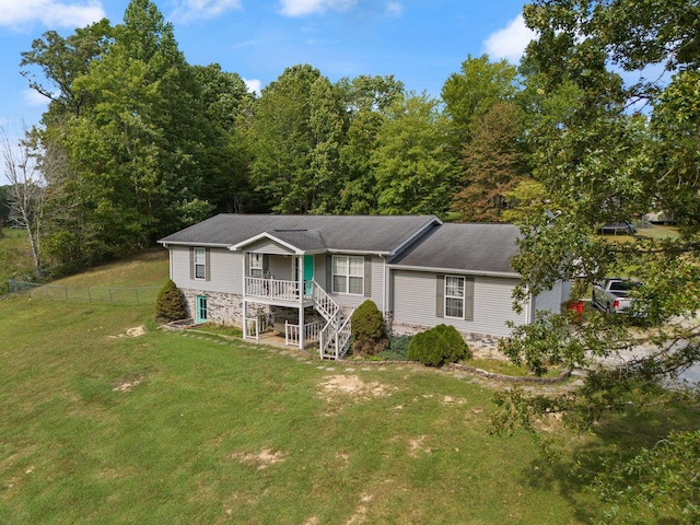 view of front of property featuring covered porch and stone siding