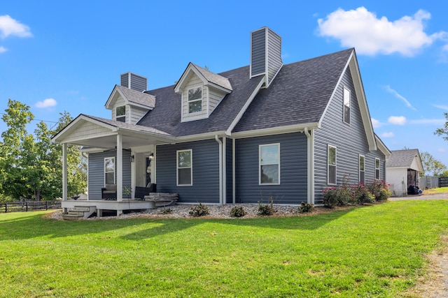 view of front of home with a front yard