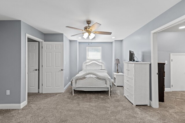 bedroom featuring carpet and ceiling fan