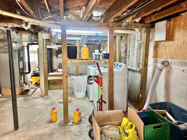 basement featuring separate washer and dryer