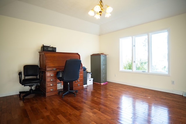 office space featuring dark hardwood / wood-style floors and an inviting chandelier