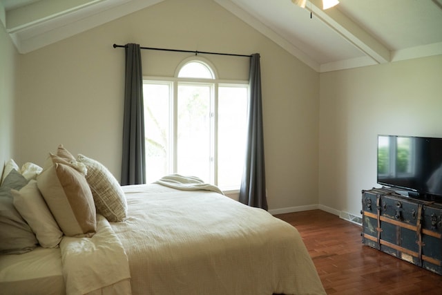 bedroom featuring dark hardwood / wood-style flooring and lofted ceiling with beams