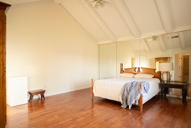 bedroom featuring high vaulted ceiling, ceiling fan, beam ceiling, and wood-type flooring