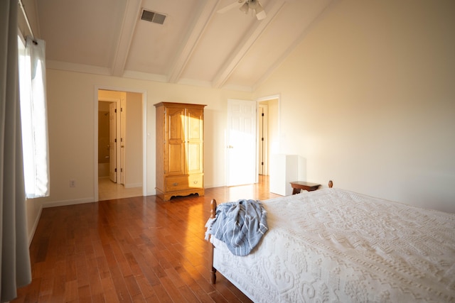 bedroom with wood-type flooring, lofted ceiling with beams, and ceiling fan