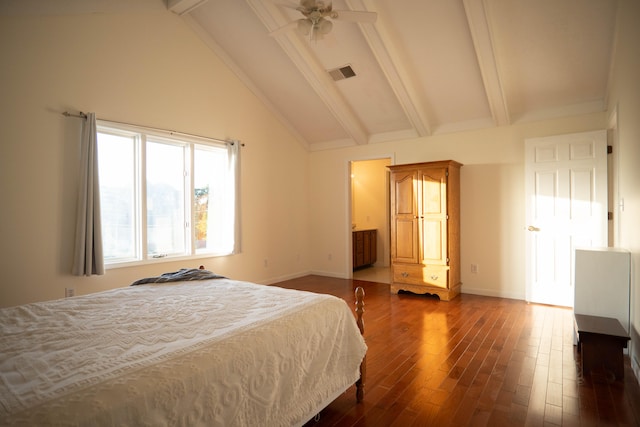 bedroom with ensuite bath, lofted ceiling with beams, dark wood-type flooring, and ceiling fan