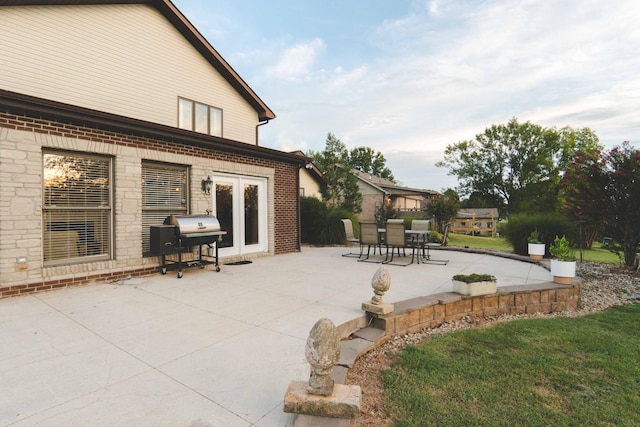 view of patio with a grill