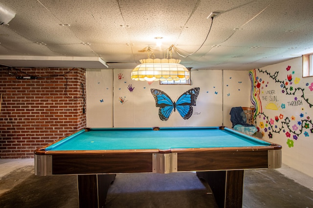 recreation room featuring concrete flooring and pool table