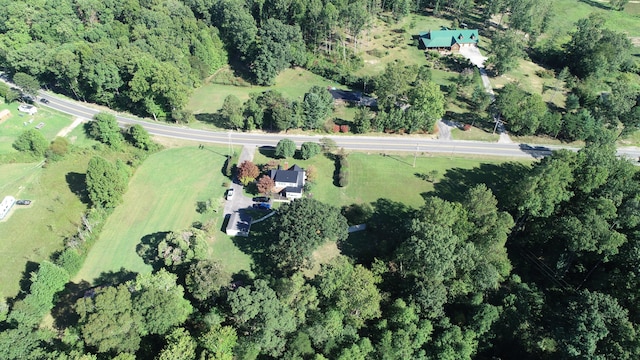 birds eye view of property with a rural view