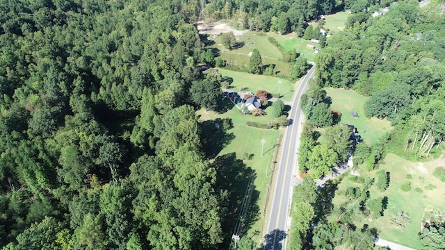 birds eye view of property featuring a rural view