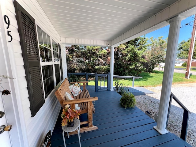 wooden terrace with covered porch