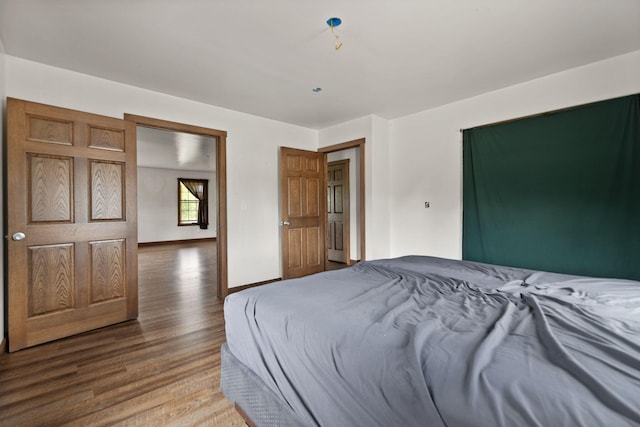 bedroom featuring hardwood / wood-style flooring