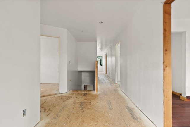 hallway featuring wood-type flooring