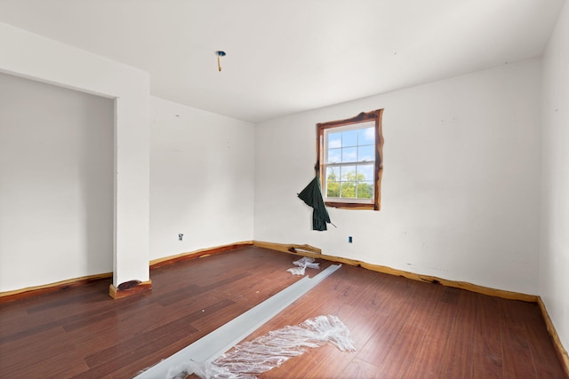 empty room featuring hardwood / wood-style flooring