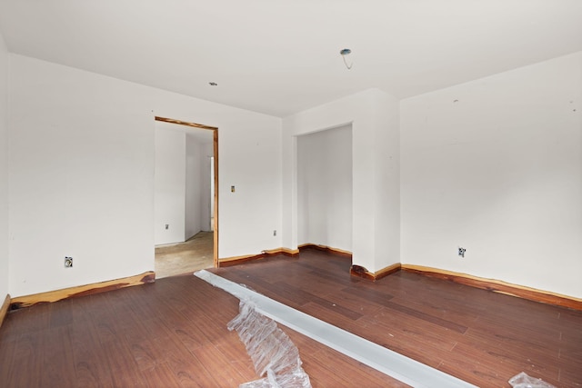 spare room featuring light hardwood / wood-style flooring