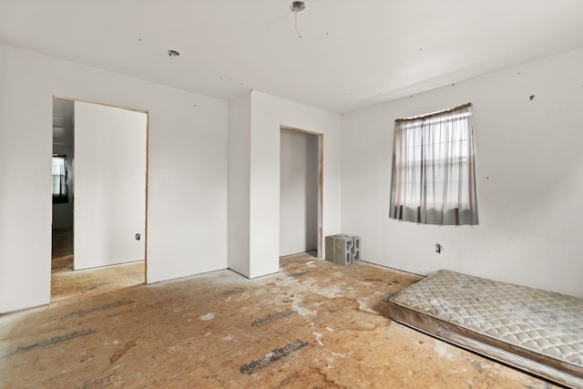 unfurnished bedroom featuring a closet