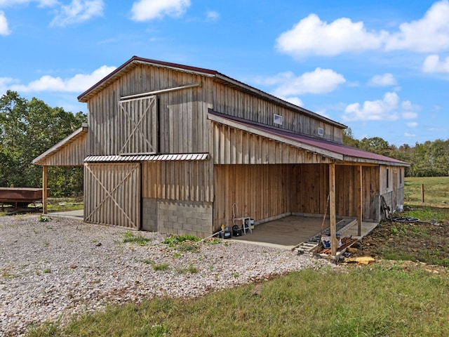 exterior space with an outbuilding