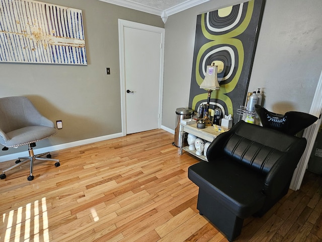 interior space with ornamental molding and light hardwood / wood-style floors