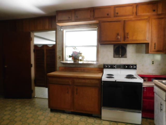 kitchen featuring white electric range oven