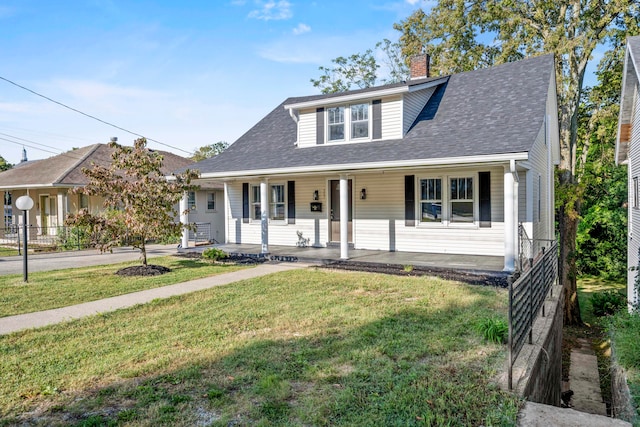 view of front of house with a front lawn and a porch