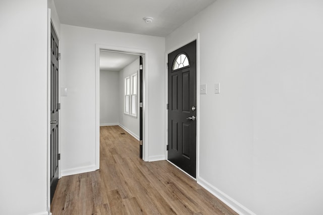 foyer with light hardwood / wood-style flooring