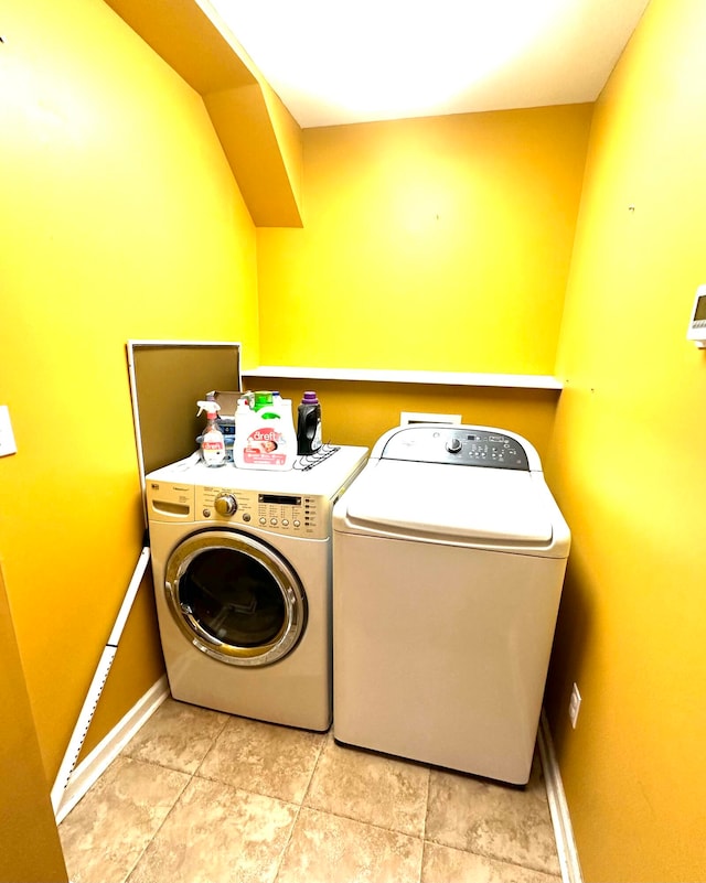 washroom featuring separate washer and dryer