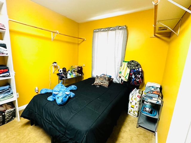 bedroom featuring carpet flooring