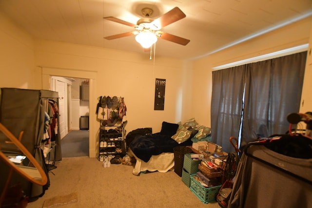 carpeted bedroom featuring ceiling fan