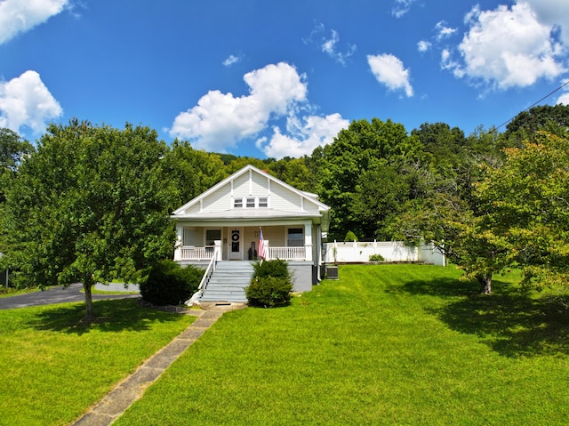 369 Broadway St, Irvine, KY 40336 - bungalow featuring a porch, stairway, and central AC unit